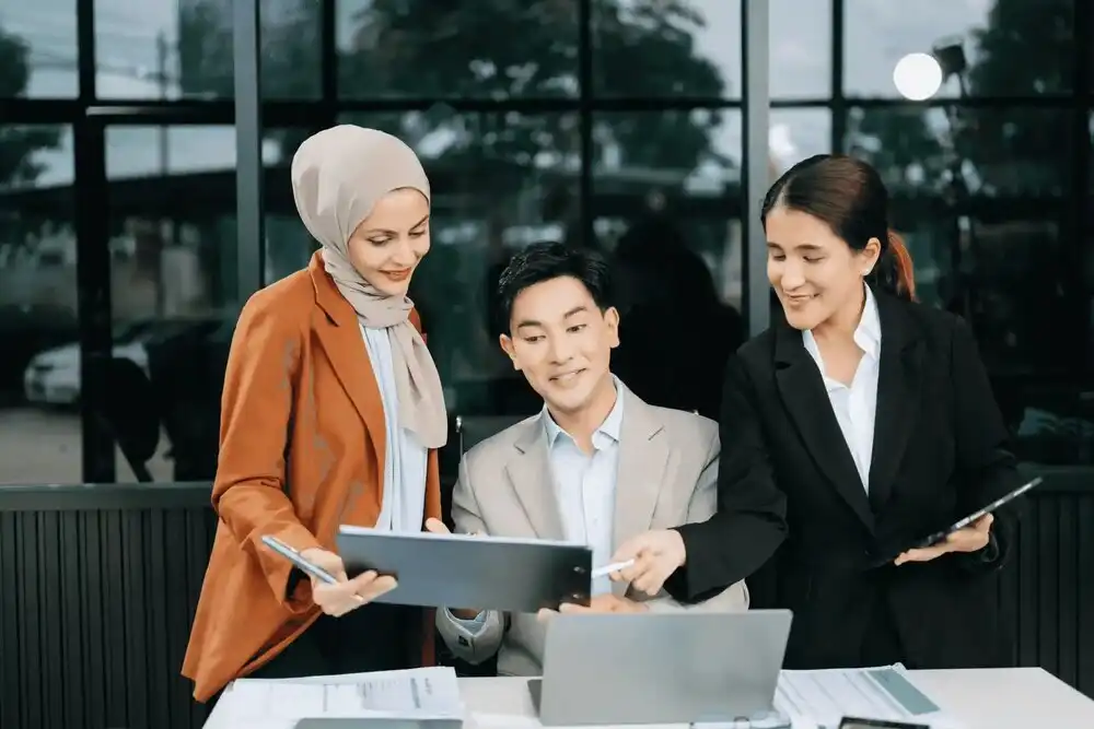 asian-businesspeople-while-collaborating-on-a-new-2024-11-02-00-29-26-utc-scaled (1)